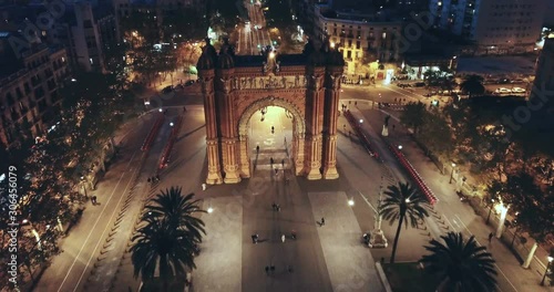 Aerial view of iconic landmark of Barcelona - Triumphal Arch (Arco de Triunfo) on central avenue at twilight, Spain photo