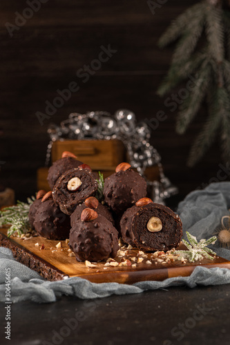 Dark chocolate truffles with hazelnuts