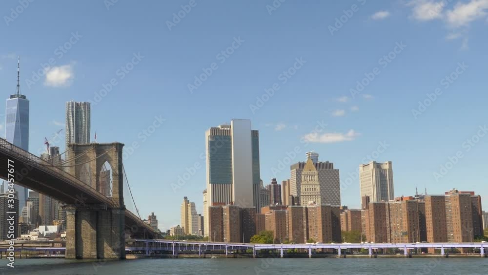 Scanning Manhattan Skyline toward South End of NYC passing Skyscrapers & Brooklyn Bridge Scanning Manhattan Skyline toward South End of NYC passing Skyscrapers & Brooklyn Bridge