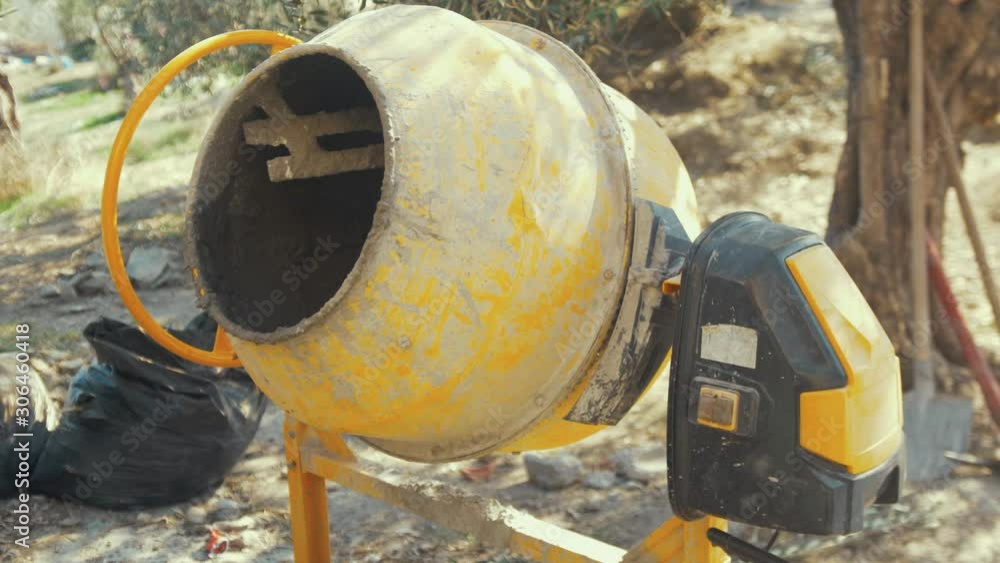 cement mixer yellow on construction site cement mixer yellow on construction site