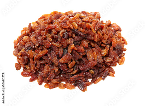 brown raisins on a white background