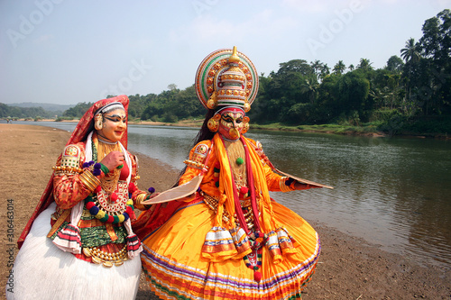 Kadhakali, a rare perfoming folk dance of Kerala state ,on the banks of Pampa river photo