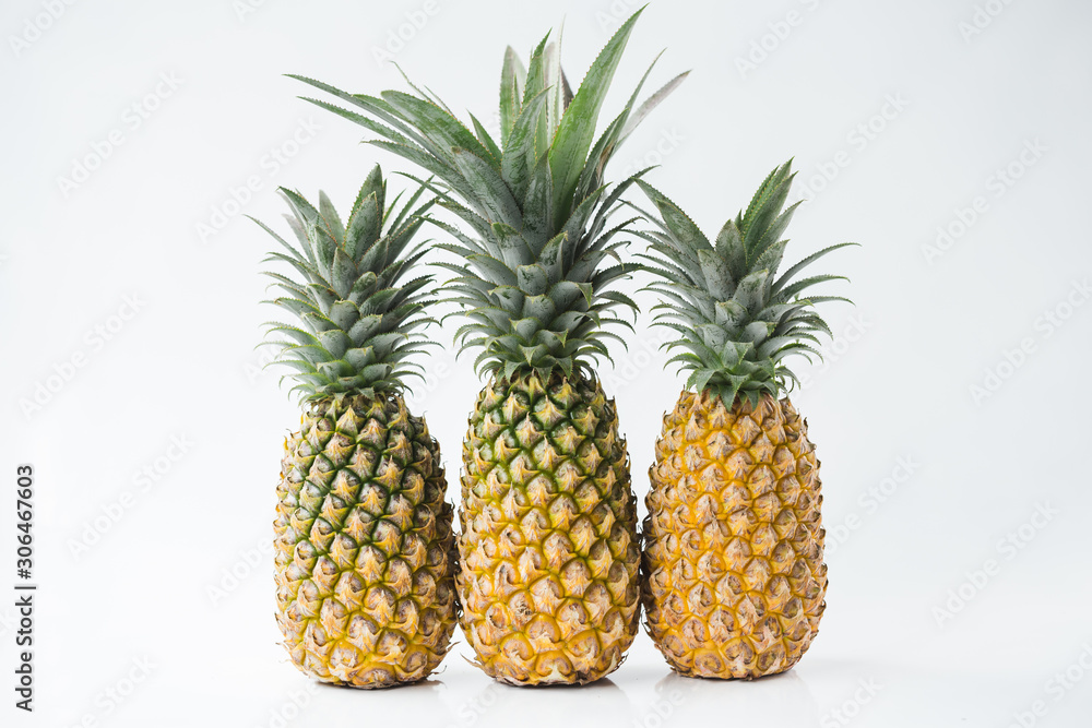 Fresh pineapples on the white background