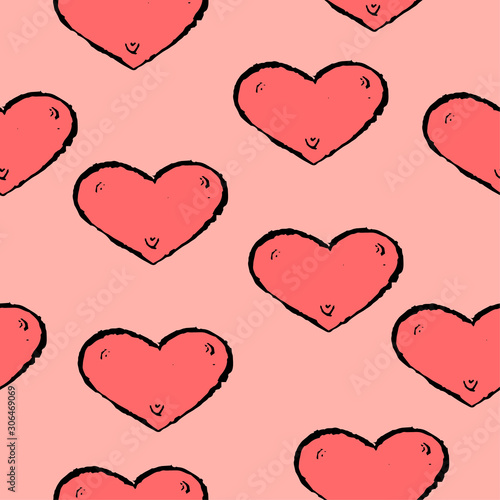 Red valentine's day hearts on a pink background. Seamless pattern.