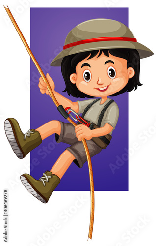 Happy girl climbing rope