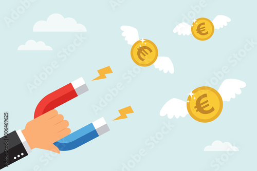 Businessman attract money euro coins with a large magnet