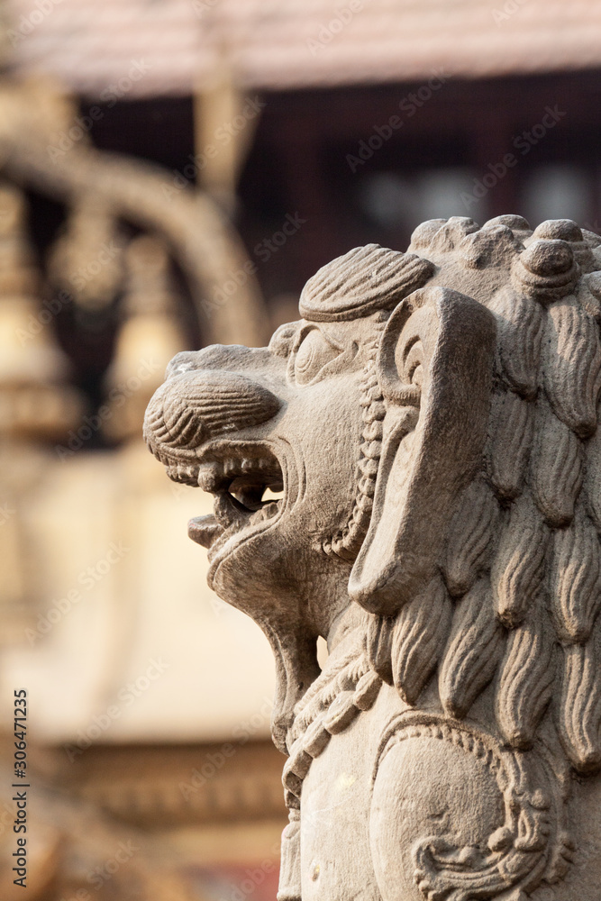 BHAKTAPUR, NEPAL APRIL 30 - A carving of a lion in Bhaktapur, Nepal on April 30th 2014