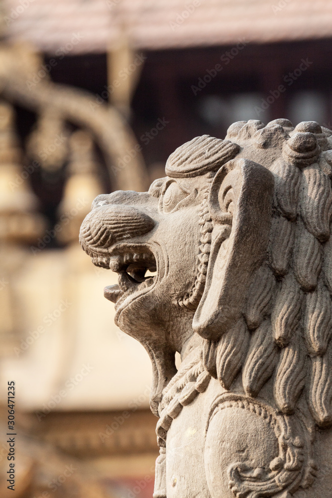 Naklejka premium BHAKTAPUR, NEPAL APRIL 30 - A carving of a lion in Bhaktapur, Nepal on April 30th 2014