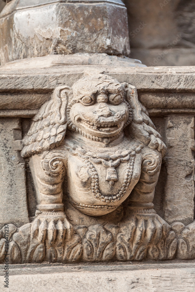 A stone lion carved into a temple step in Bhaktapur, Nepal.