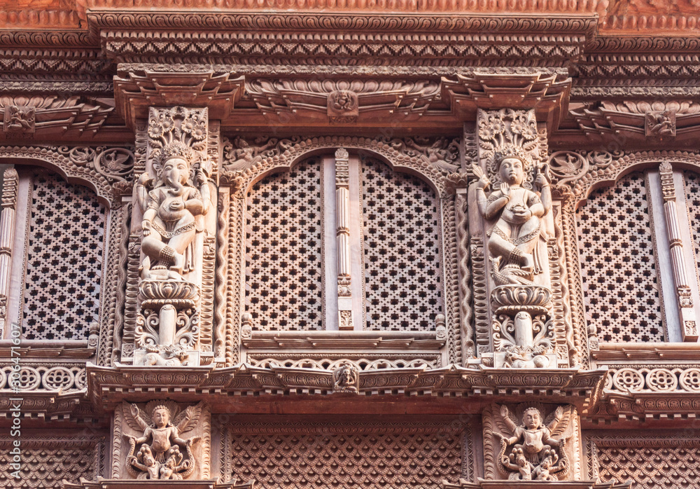 An intricately carved window frame in Bhaktapur, Nepal.