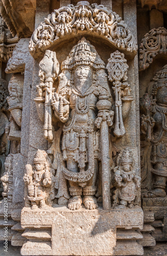 A carving of the Hindu God Brahma at the 13th Century temple of Somanathapur, Karnataka, South India.