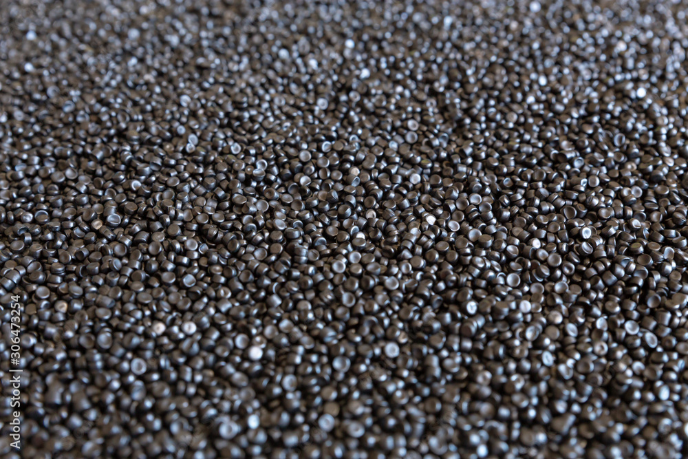 Close-up of plastic polymer granules. hand hold Polymer pellets. polymer plastic. compound polymer. Close-up of plastic polymer granules. hand hold Polymer pellets. polymer plastic. compound polymer.