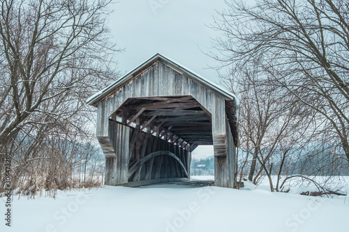 Covered Bridge during winter, Vermont, USA.