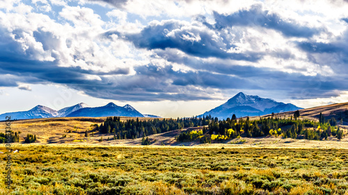 The Gallatin Mountain Range with Electric Peak under later afternoon sun. Viewed from the Grand Loop Road near Mammoth Hot Springs in Yellowstone National Park, Wyoming, United States photo