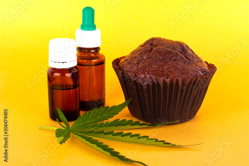 chocolate cake with cannabis oil. Brown muffin by adding recreational marijuana with high THC content.