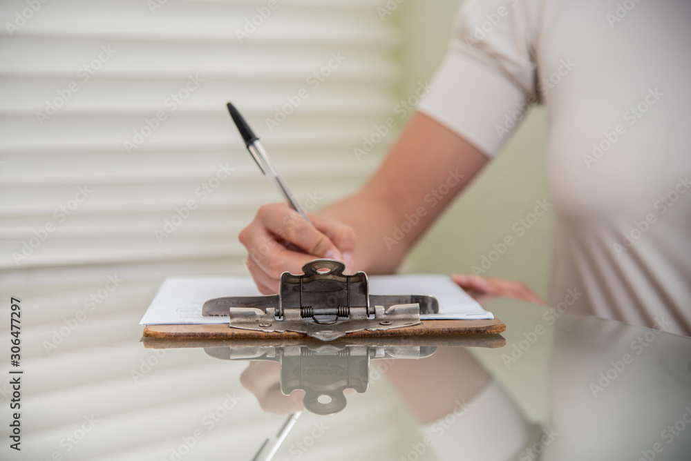 Business woman working in office with documents Business woman working in office with documents