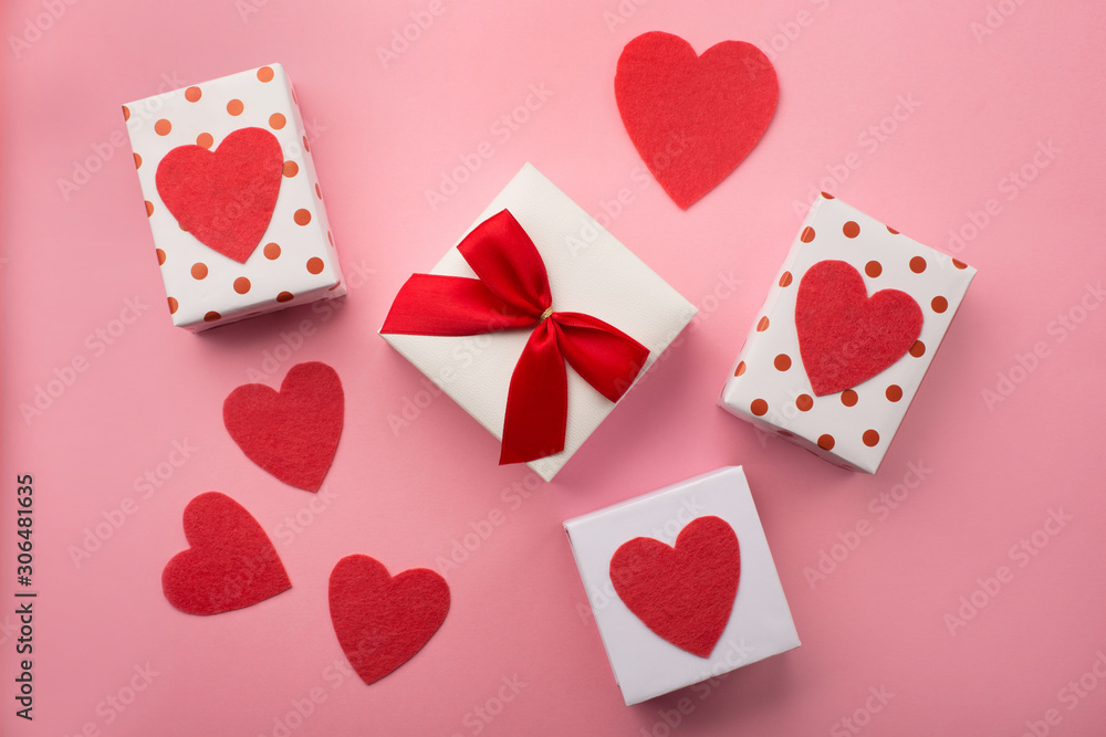 Valentines gift boxes, red bow and felt hearts Valentines gift boxes, red bow and felt hearts