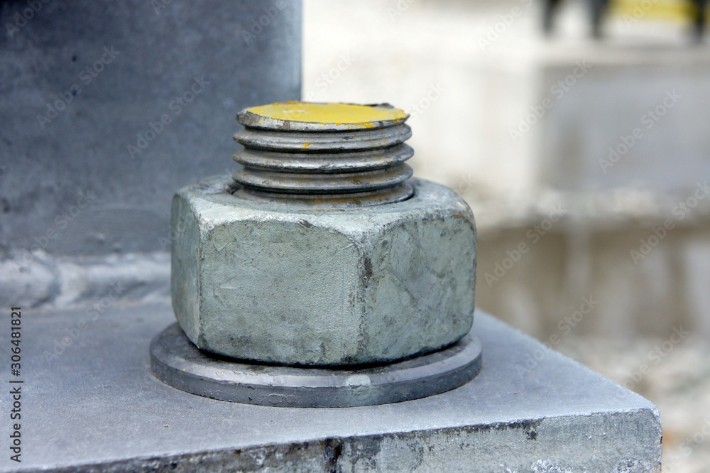 Big metal nut on the metal plate Big metal nut on the metal plate