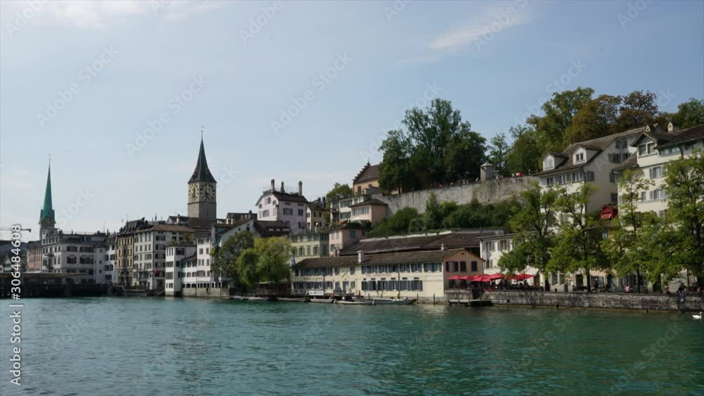 Timelapse Zurich city center with famous Fraumunster and Grossmunster Churches and river Limmat at Zurich Lake in Switzerland Timelapse Zurich city center with famous Fraumunster and Grossmunster Churches and river Limmat at Zurich Lake in Switzerland