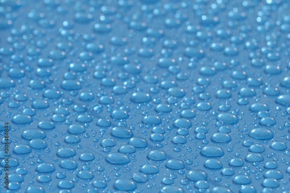 Rain drops on the blue PVC  suface