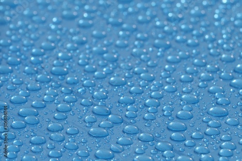 Rain drops on the blue PVC suface
