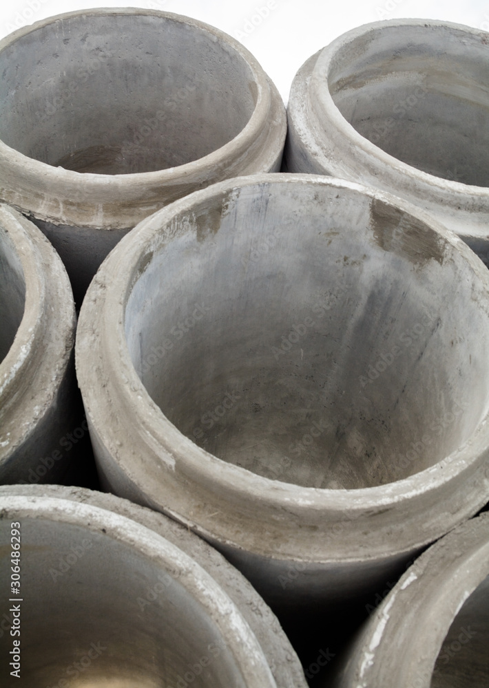 Stack of new concrete pipes.