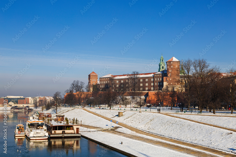 Historic Royal castle Wawel in Krakow on the banks of the Vistula river in winter, Poland
