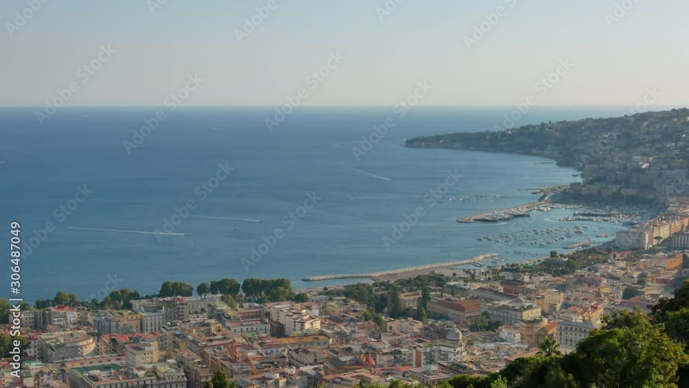Static panorama view on Naples city on golden hour in summer. Italy on August 2019. Static panorama view on Naples city on golden hour in summer. Italy on August 2019.