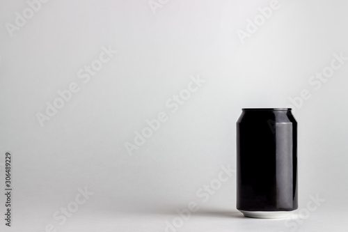 Black aluminum can on a white background. Mock-up.