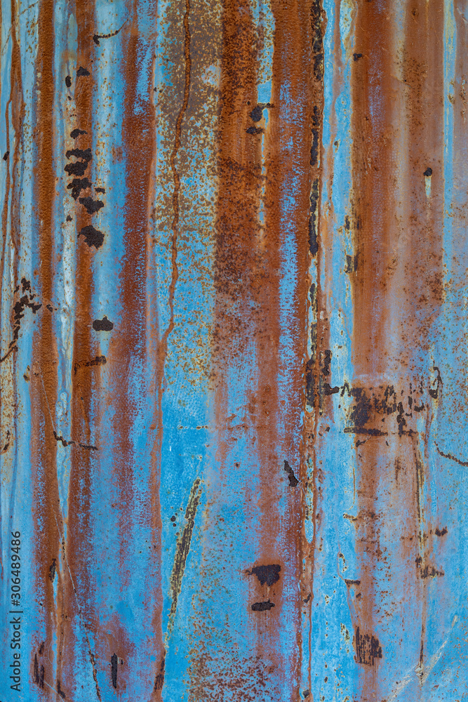 Metal texture with scratches and cracks which can be used as a background. Old rusted metal blue barrel. Rusty old paint. The grunge dirty texture. The material floor surface is rusty old blue steel. Metal texture with scratches and cracks which can be used as a background. Old rusted metal blue barrel. Rusty old paint. The grunge dirty texture. The material floor surface is rusty old blue steel.