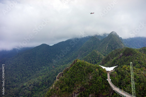 LANGKAWI, MALAYSIA - 25th NOV 2019; The Langkawi Sky Bridge is located at cable-car ride. One of the island’s highlights, it is a 410 ft-long curved pedestrian bridge above Mat Cinchang.