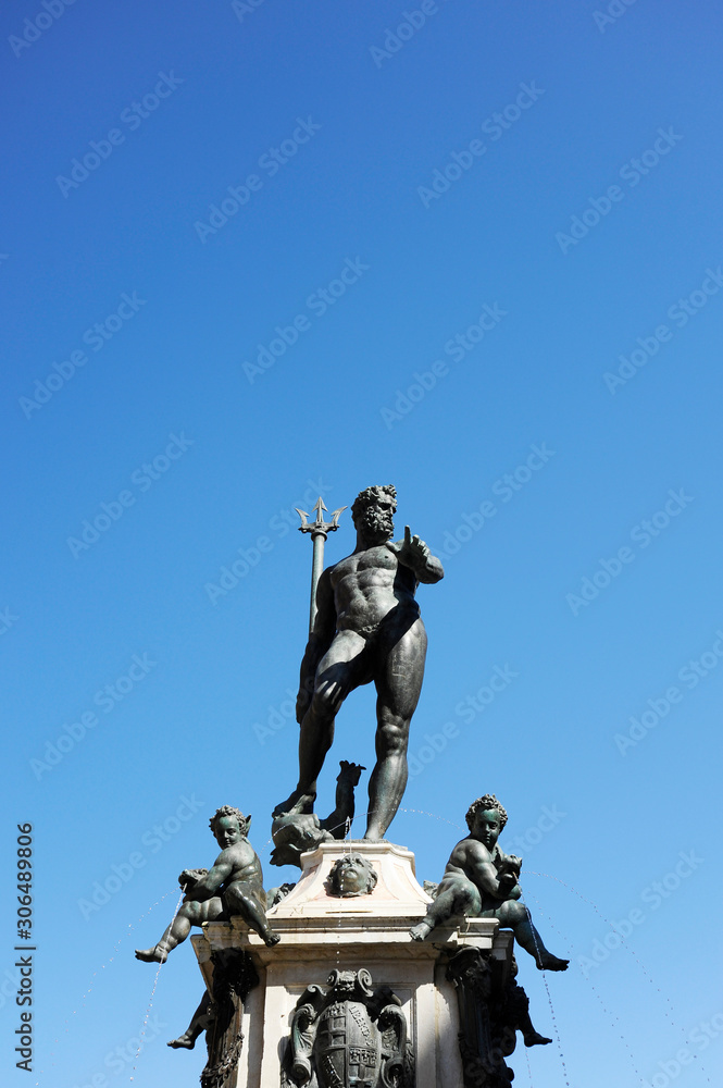 The antique statue of Neptune, the god of water and the sea in roman mythology and religion, an famous monument of the italian Renaissance, in Bologna, Italy