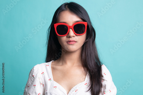Wallpaper Mural Portrait of a beautiful young asian girl in sunglasses Torontodigital.ca
