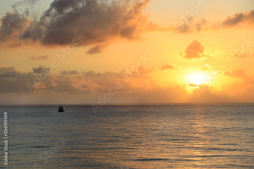Beautiful sunrise at sea © Dinadesign