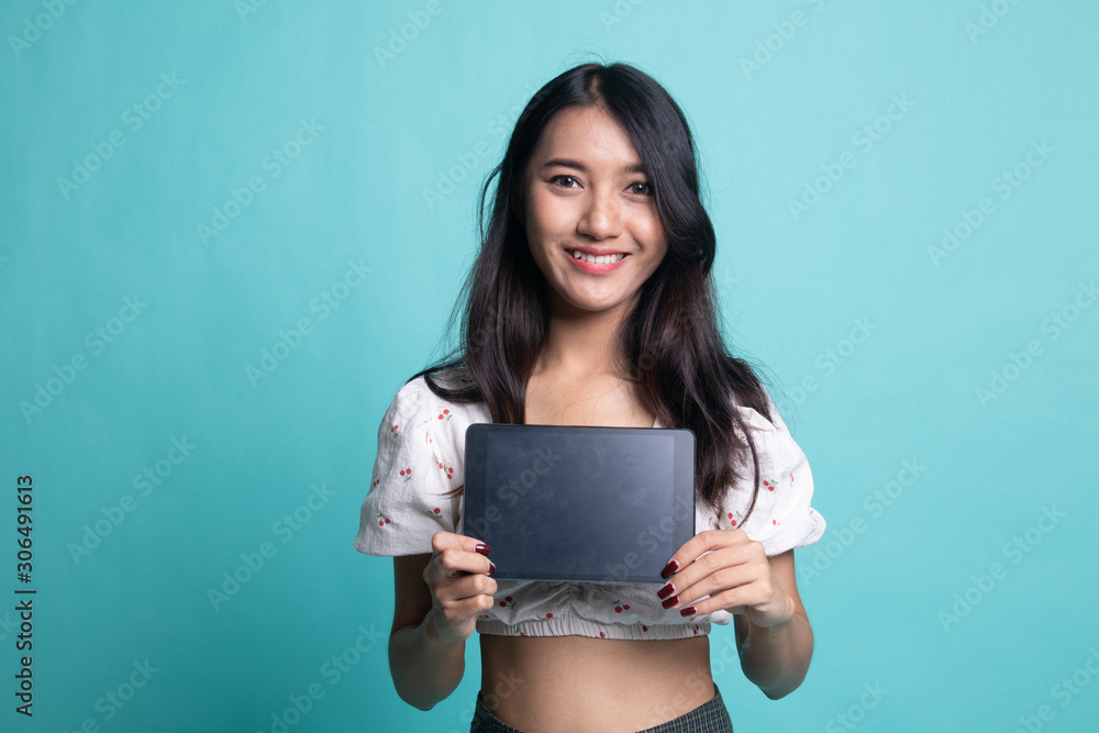 Young Asian woman with a computer tablet Young Asian woman with a computer tablet