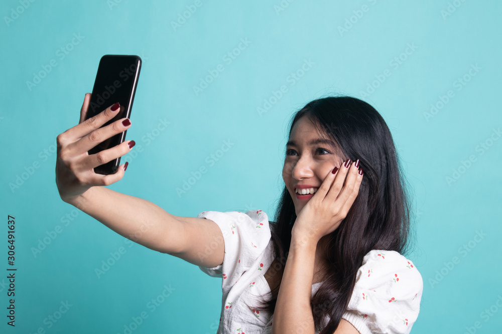 Young Asian woman selfie with mobile phone Young Asian woman selfie with mobile phone