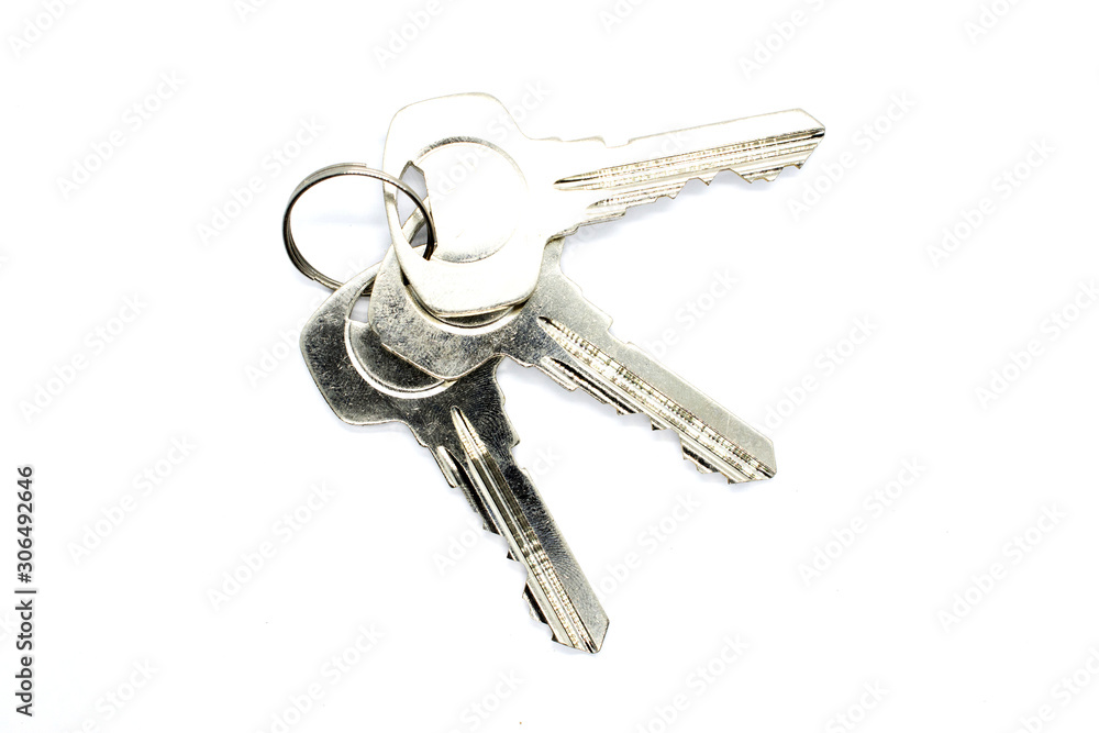 The key used for opening doors, cabinets and more isolated on white background The key used for opening doors, cabinets and more isolated on white background
