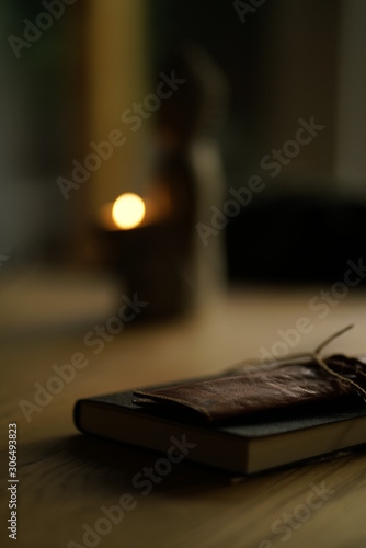candle on wooden table