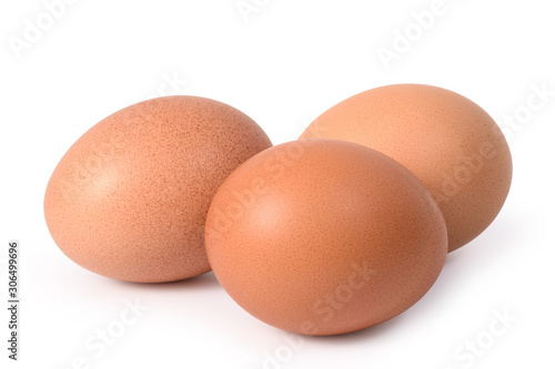 Three brown eggs isolated on white background.Entire image in sharpness.