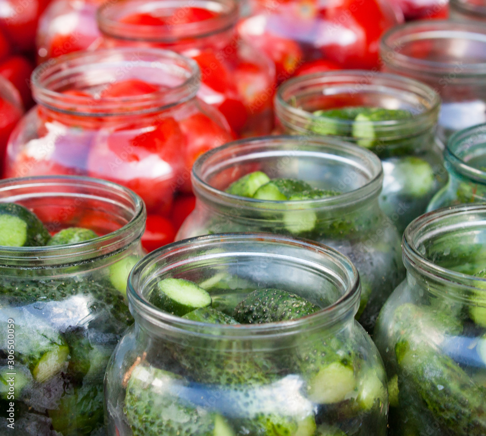 Pickling (canning) tomatoes and cucumbers. Pickling (canning) tomatoes and cucumbers.
