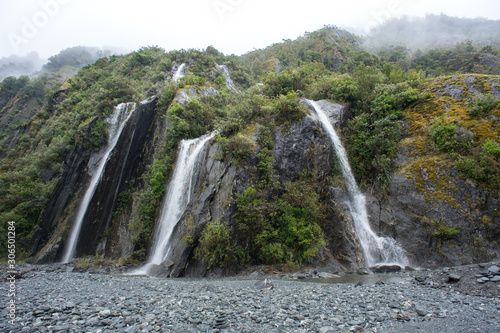 Beautiful waterfall in Franz Joseph Glacier trail  New Zealand.