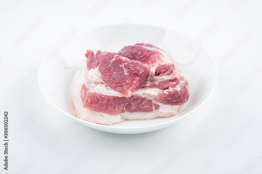 Piece of fresh pork on white background