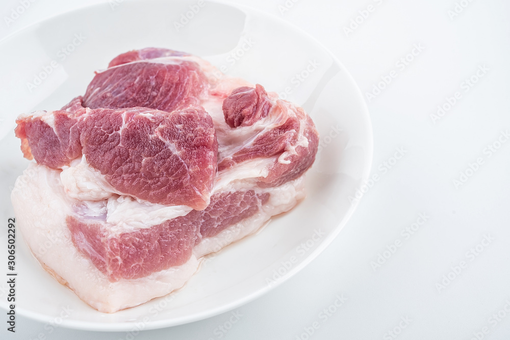Piece of fresh pork on white background Piece of fresh pork on white background