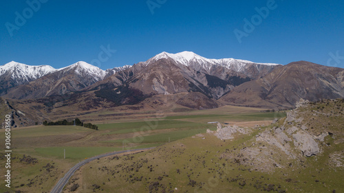 Aerial View of Castle Hills at Arthur's Pass route,South Island New Zealand with snowcap mountain in background.