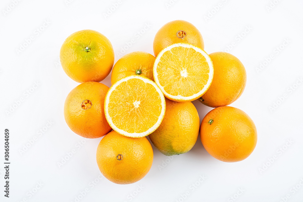 Fresh Nangan Navel Orange and pulp slices on white background Fresh Nangan Navel Orange and pulp slices on white background