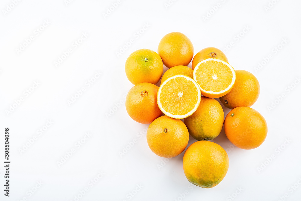 Fresh Nangan Navel Orange and pulp slices on white background Fresh Nangan Navel Orange and pulp slices on white background