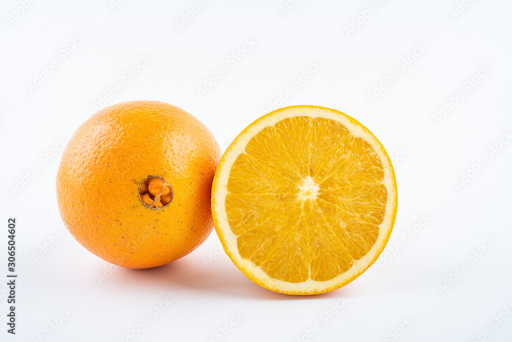 Fresh Nangan Navel Orange and pulp slices on white background Fresh Nangan Navel Orange and pulp slices on white background