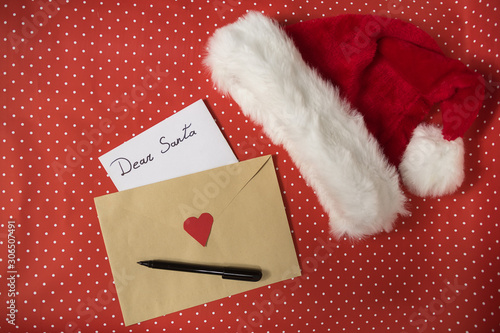 Wallpaper Mural Letter for Santa in an envelope, pen. Santa hat. Red polka dot background Torontodigital.ca