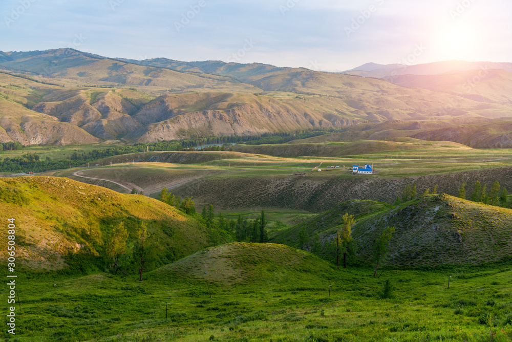 Fototapeta premium Landscape of alpine meadow with sunrise scenery