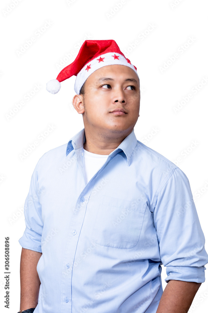 portrait of casual asian man wear red santa hat portrait of casual asian man wear red santa hat